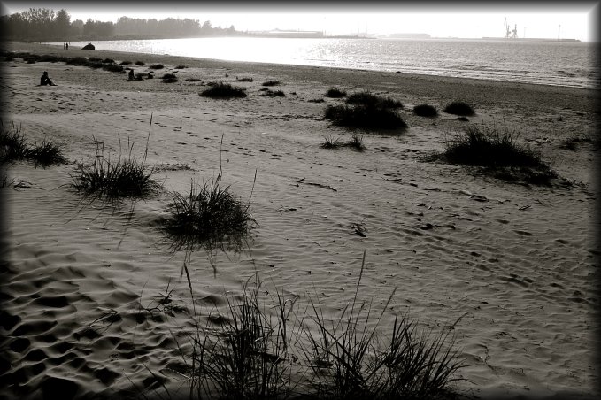 A few people were on the beach, mostly sitting up and staring at the sea. The wind was strong and it was a little chilly (by my own standards, that is).