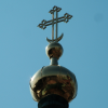 At the very top of the Uspenski Orthodox cathedral, a cross.