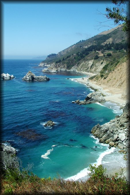 Behind me is McWay waterfall. On the other side of the trail, we have a view of beaches along the coastline.