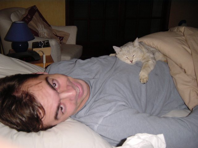 Emu sprawled on Steph's belly