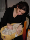 Emu in her basket on Colleen's lap