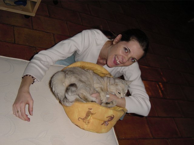 Emu biting Coralie's forearm