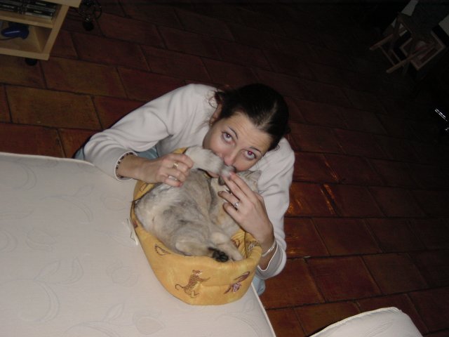 Coralie making a mustacke out of Emu's tail