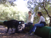Laurie and Urgo, Alice and Unix seated on pipe