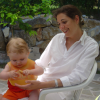 Alexis on Coralie's lap