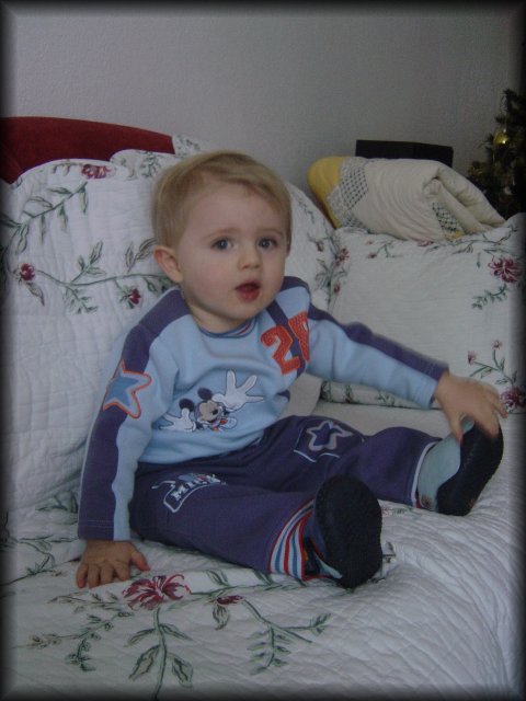 Alexis sat on the couch eventually (or fell graciously)