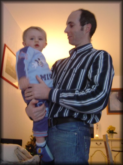 Alexis in the arms of Olivier, his father