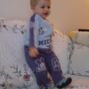 Alexis giggling on the couch (must have been something amusing on TV)