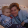 Alexis and Christine giggling on the couch
