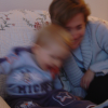 Alexis and Christine giggling on the couch