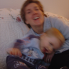 Alexis and Christine giggling on the couch