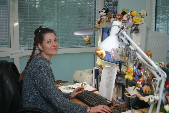 Coralie at her desk