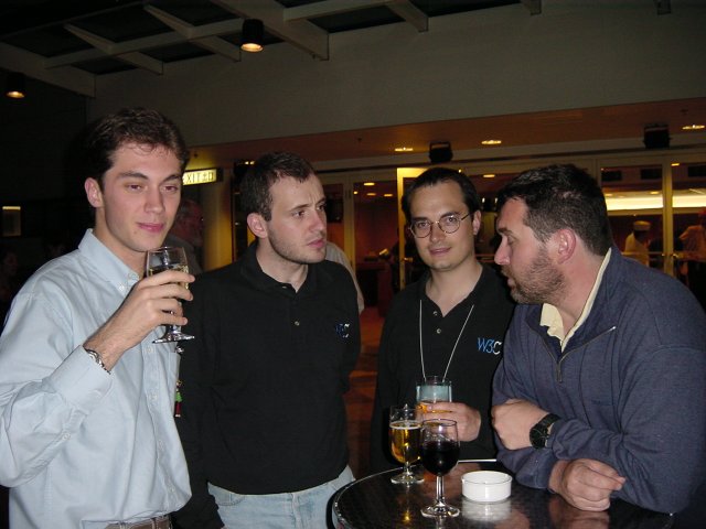Olivier holding a glass, Hugo, Gerald holding a glass, Daniel