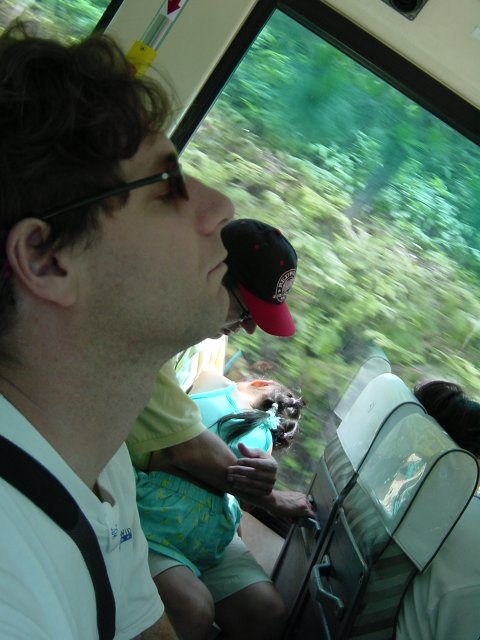 Ian sleeping in the foreground, dad and daughter asleep in the background