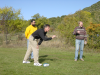 Steve aiming before throwing, Simon and Bert behind