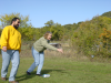 Susan throwing, Simon watching closely