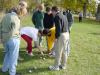 Ian and Simon arguing while every one else watch the boules