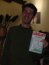 Karl holding a pack of powder milk "Lovelait"