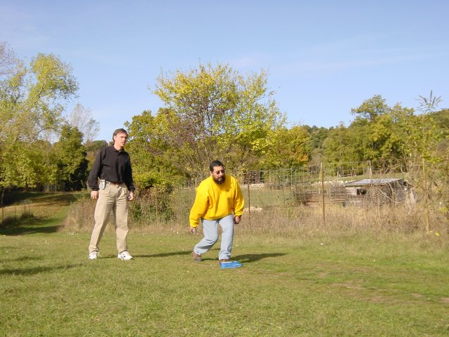 Simon about to throw the bowl, Steve behind