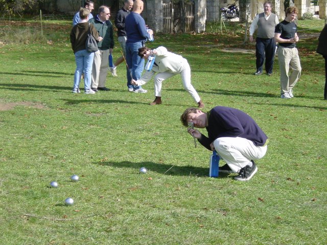 Karl crouching to take a picture