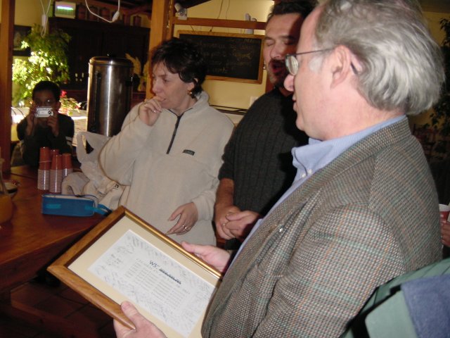 Jeff holding his award, Danield and Marie-Claire next to him