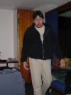 Msieur Bi, les bras balants, la langue tiree et l'air particulierement bovin