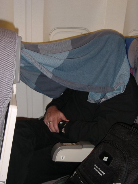 Daniel hiding/sleeping under a blanket