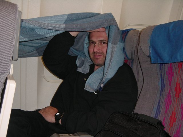 Daniel with a blanket over his head