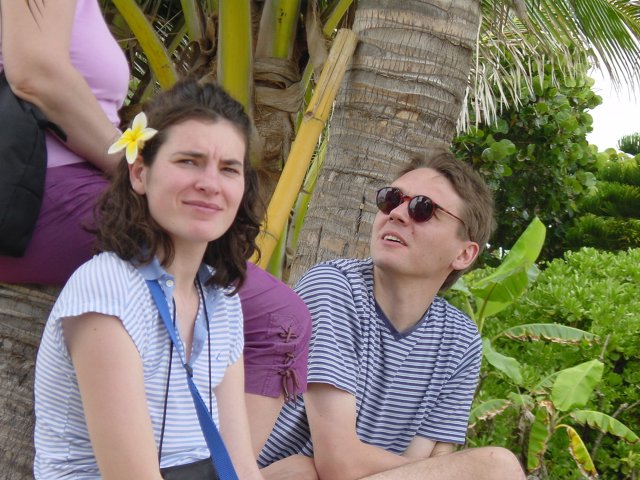 Christelle with a flower on her right ear and Max