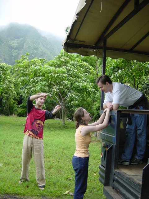 Cupid-Karl hitting Carine and Yves