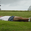 Dean stretched on the grass