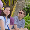 Christelle with a flower on her right ear and Max