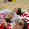 Caroline Saeko and a bit of myself, lying on the beach