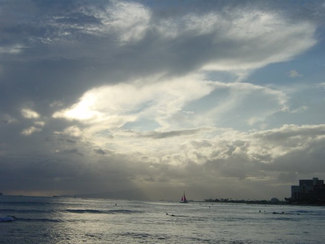 Cloudy sky over the ocean, last rays of sun of the day