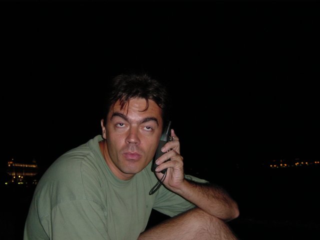 Stephane listening to his mobile and looking clever and bright