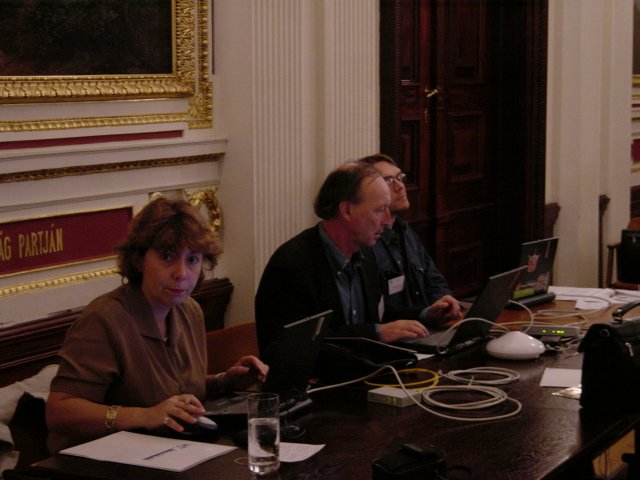 Marie-Claire, Vincent, Max, at the laptop table in the room of the event