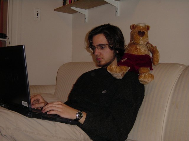 Henri geeking with Rudolfo sitting on his shoulder