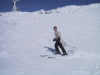 Pticul en t-shirt en haut d'une piste