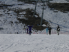 Bi levant les bras sur la fin de la piste