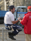 Police man in conversation with a medic
