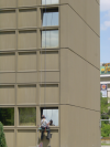 Adventure at Novotel: hanging man wiping the window panes