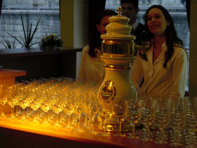 In the boat: glasses, tap and barmaids