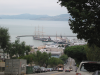 Steep road going down to the piers, cable cars, sailing boat