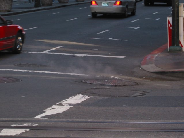 Fumes escaping from the asphalt