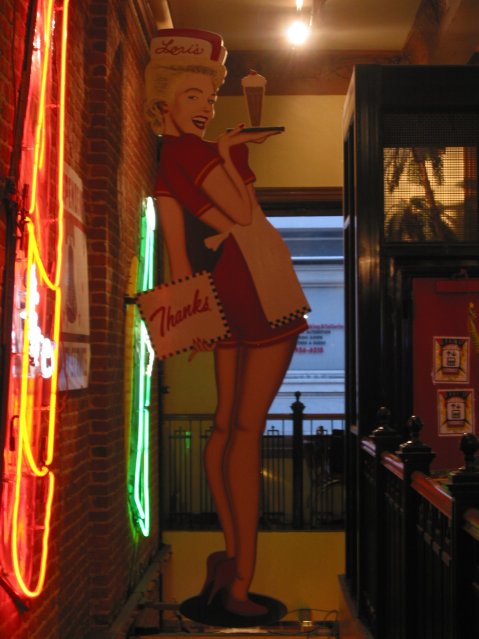 Pin up holding a "thanks" sign