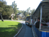 The bus and facades of houses