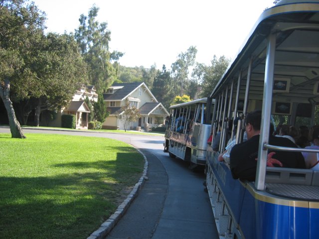 The bus and facades of houses