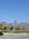 Steph sitting and watching the geyser