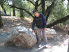 Steph touching petrified wood