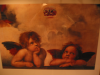Raphael's angels looking up toward a hamburger
